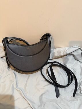 Polene Black Crescent Shoulder Bag with Gold Logo
